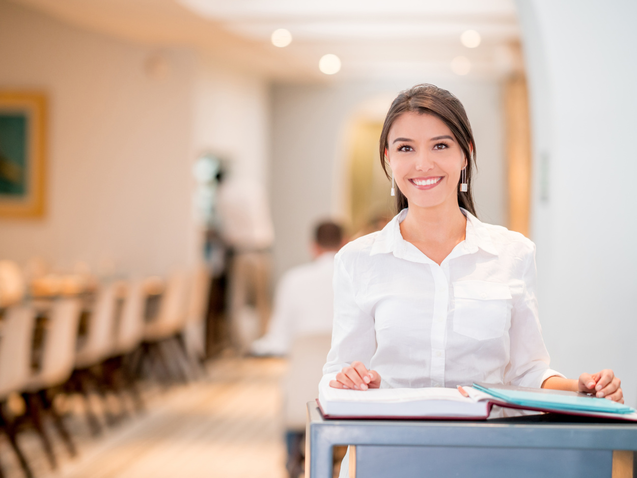 Woman working as hostess at a restaurant